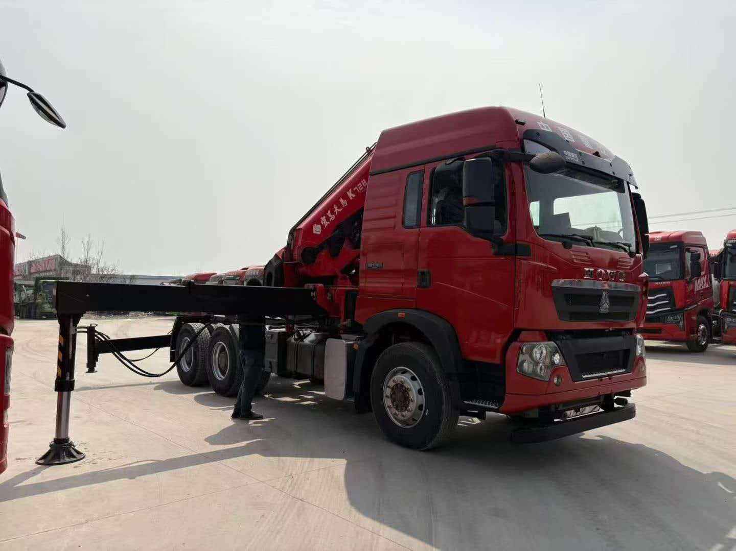 Trailer-mounted folding boom truck-mounted crane