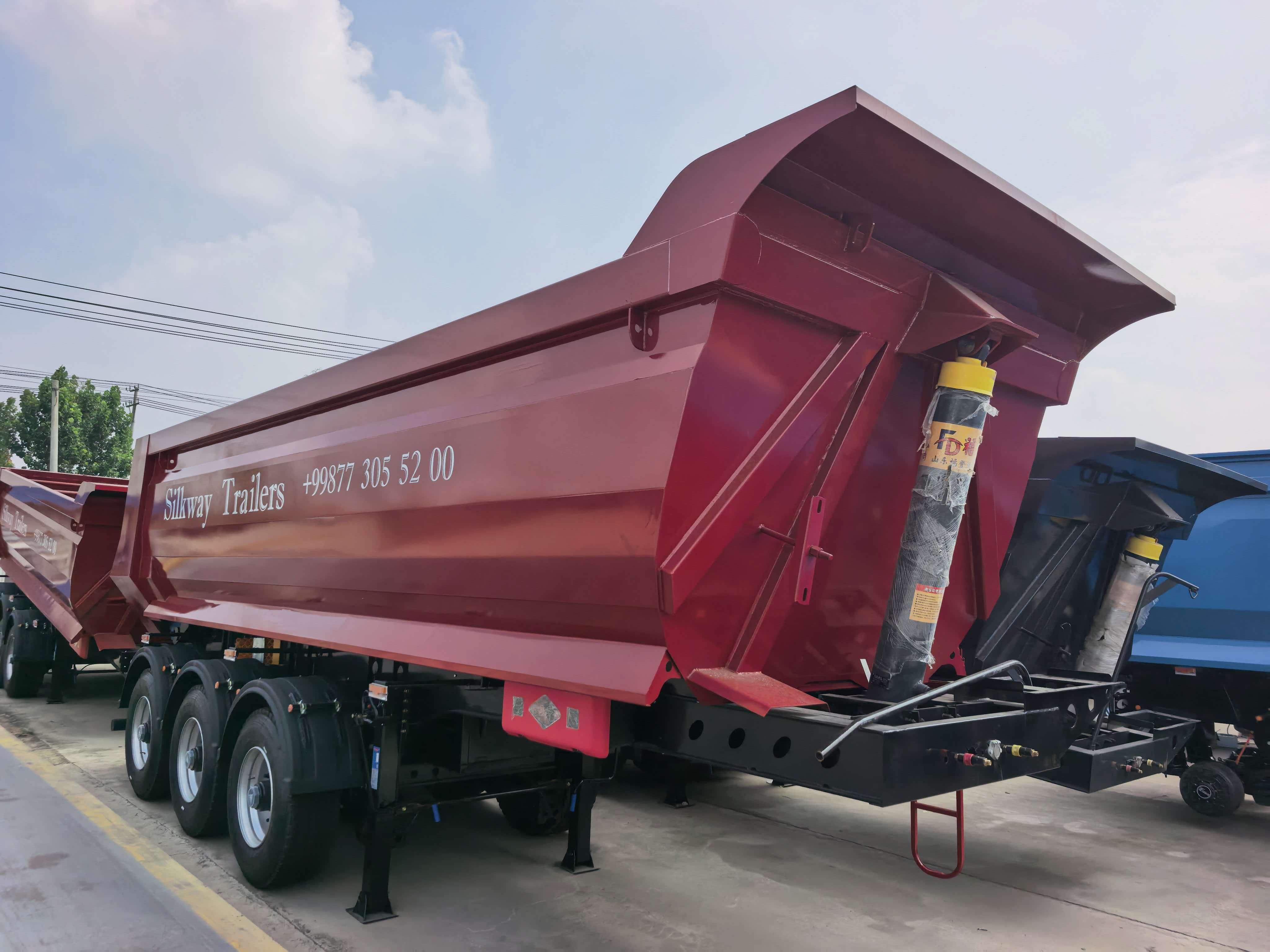End‑dump semi‑trailer