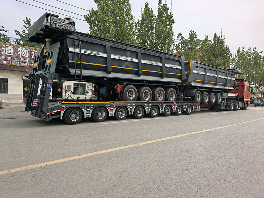 Four-axle rear-tipping self-unloading truck, 4 lines, 8 axles, special trailer.