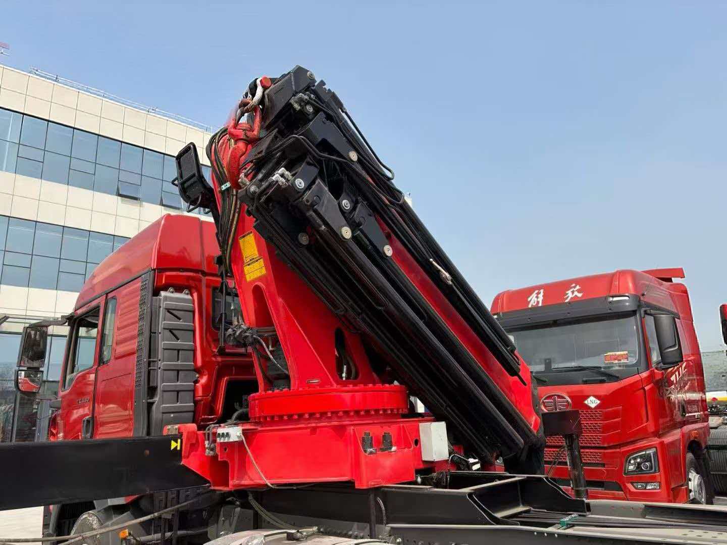 Trailer-mounted folding boom truck-mounted crane