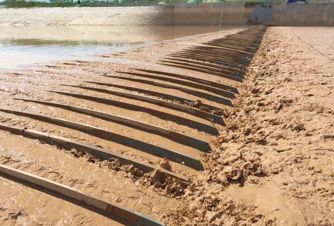 pneumatic_shield_dam_for_sediment_discharge.jpeg