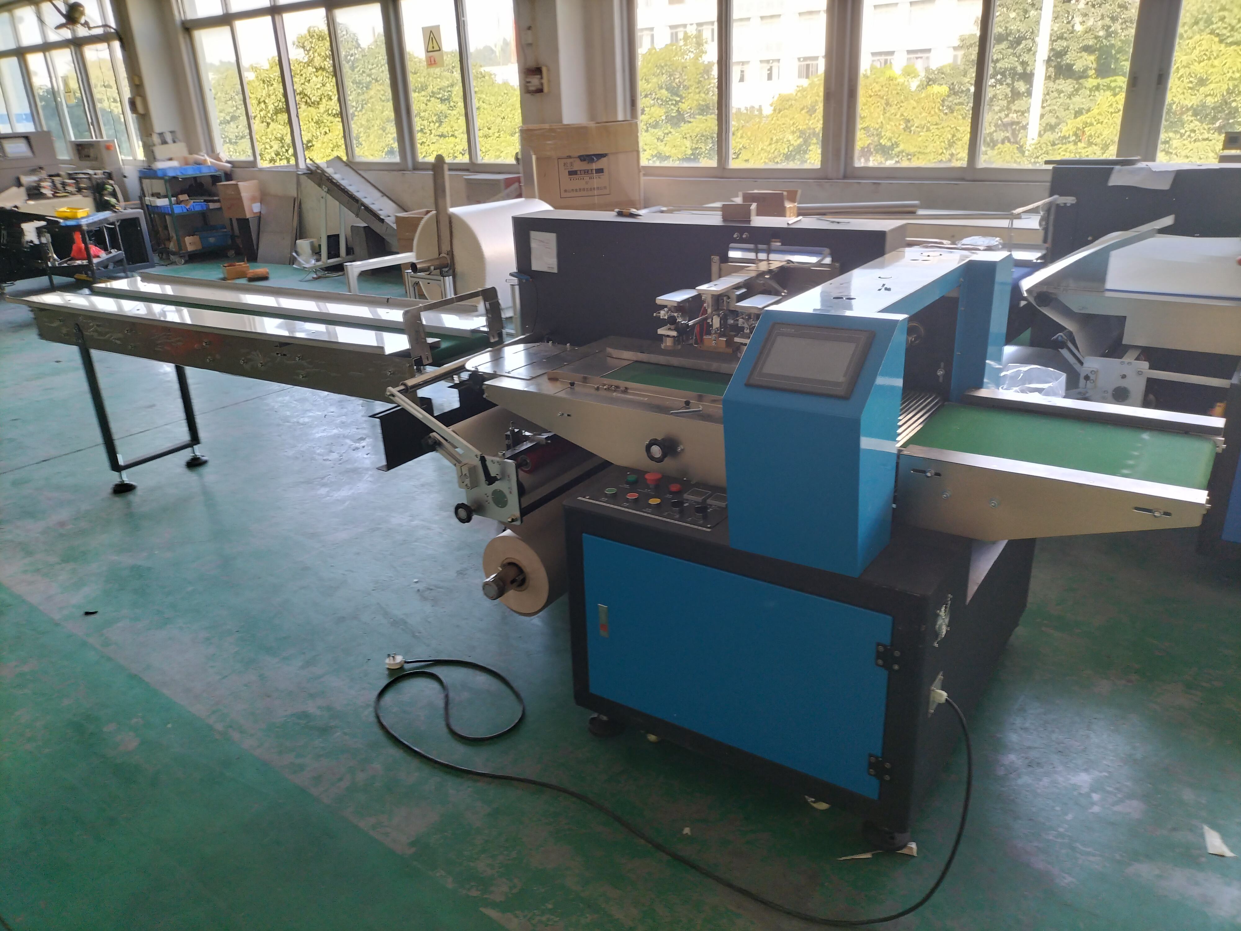 Pillow wrapping machine