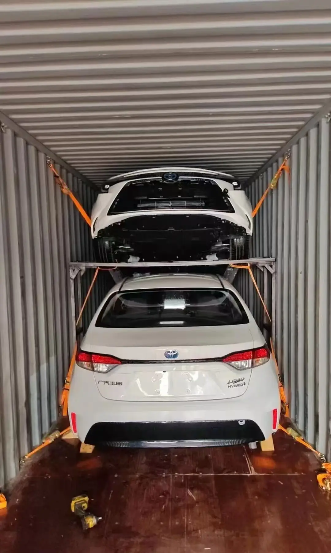 Vehicles loaded and secured inside a 40HQ container